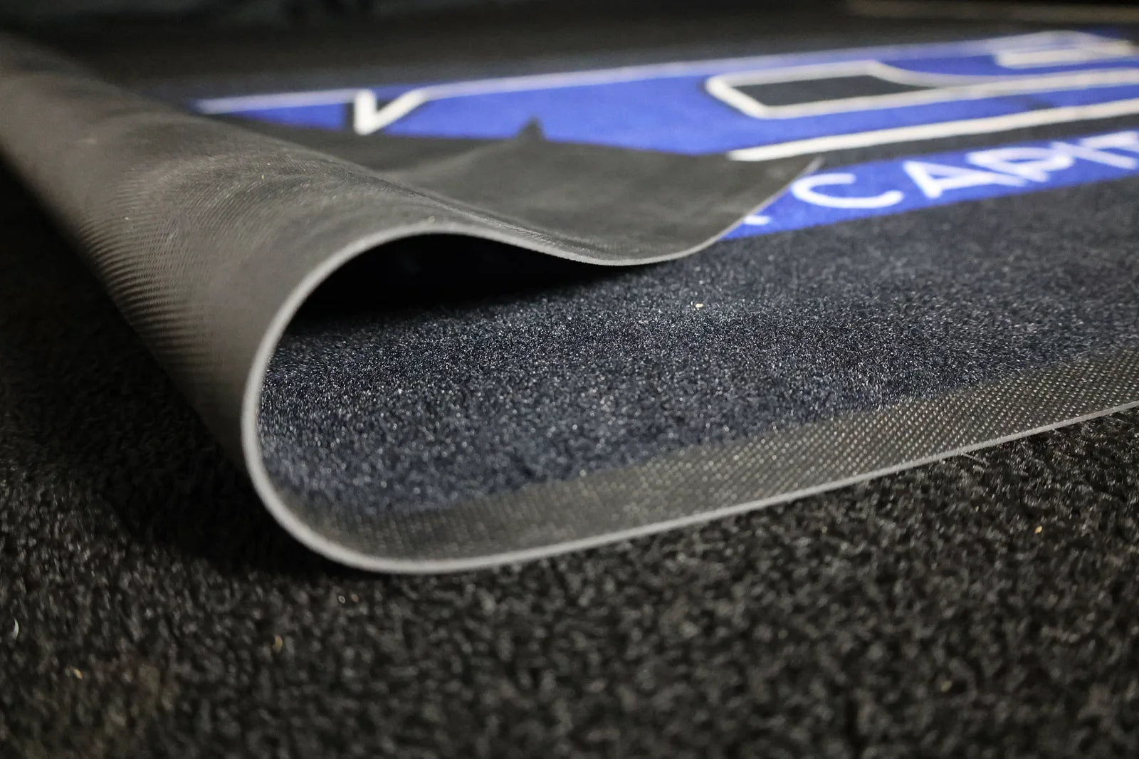 Close-up of Original MysticMat carpet and rubber backing