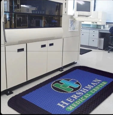 Custom printed healthcare business mat in a lab setting